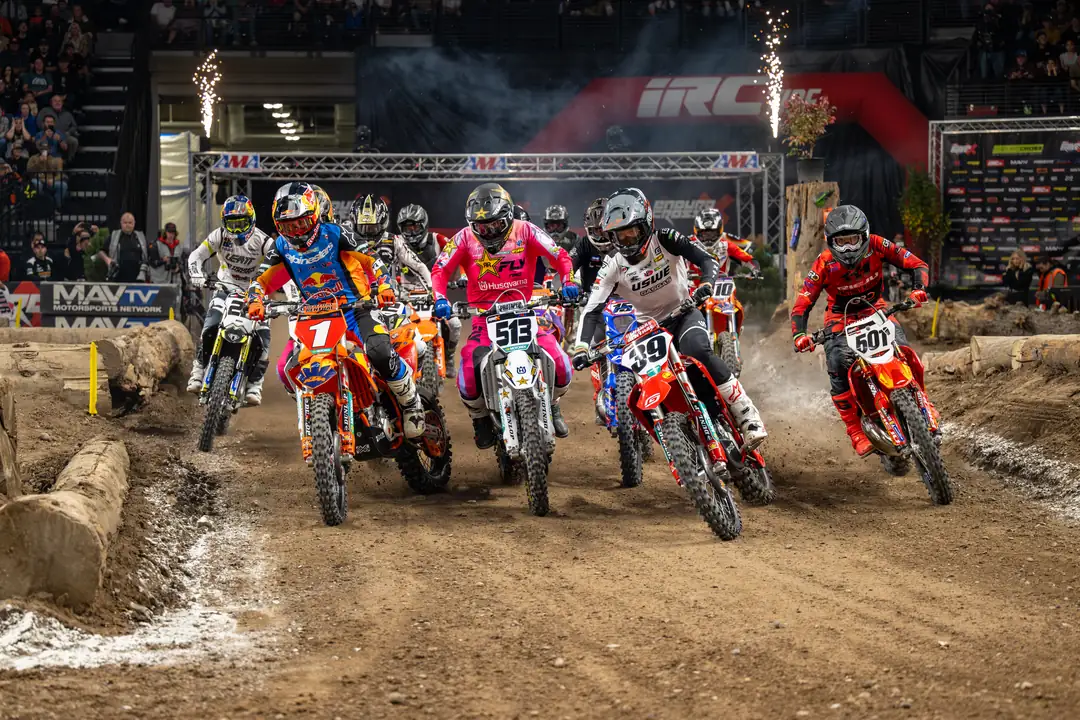The pack charging off the start into the first turn