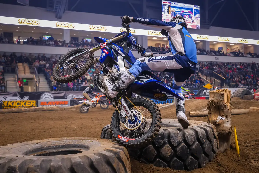 Bike bucking vertical off the tire section