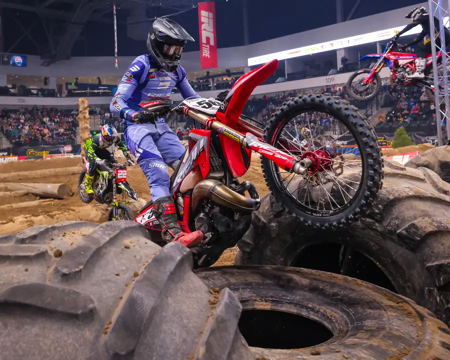 Rider charging through the tire pit
