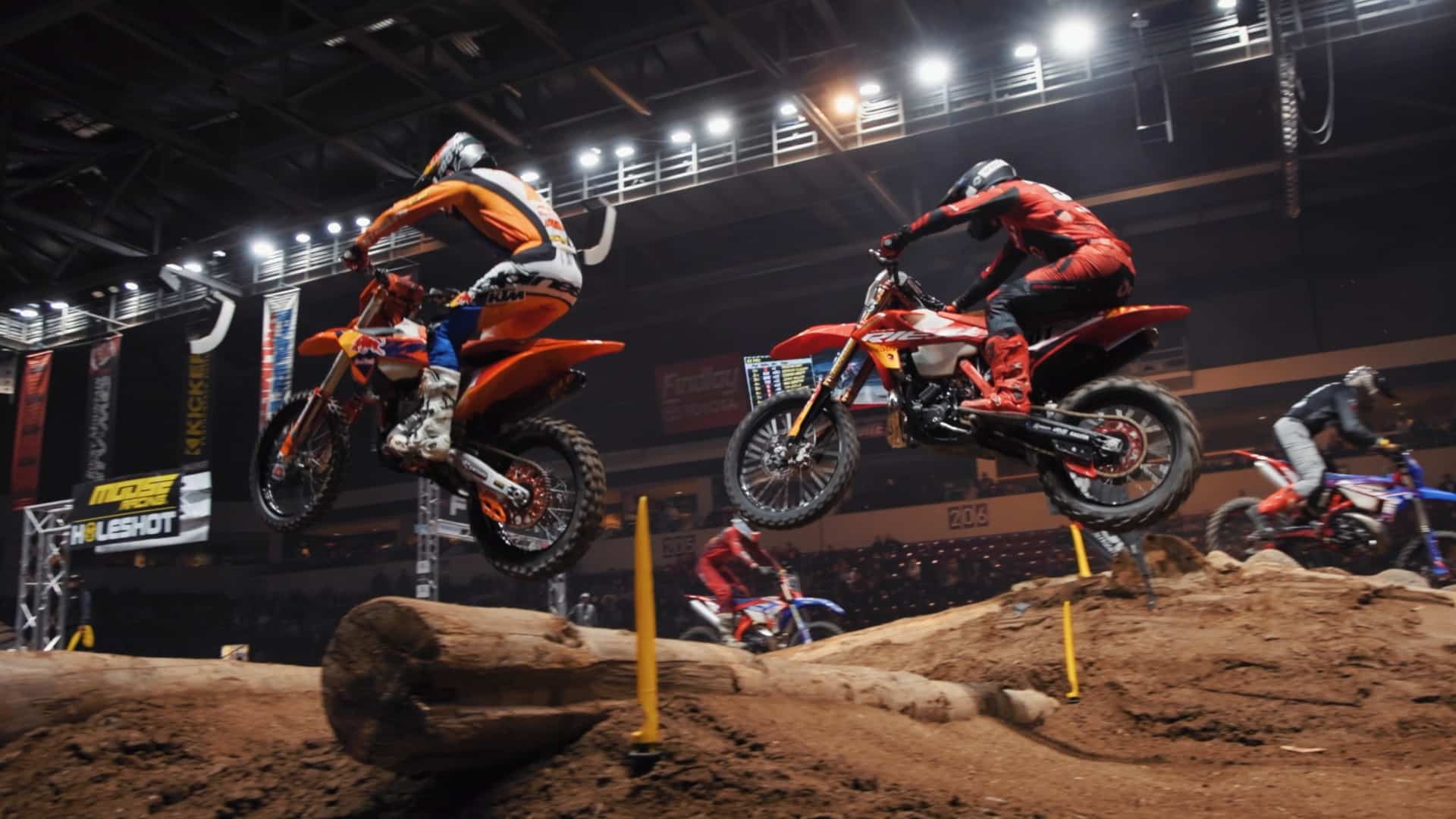 EnduroCross riders navigating an indoor obstacle course